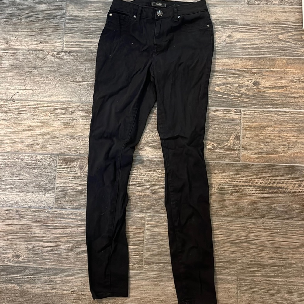 Women s uptown Skinny’s jeans - black . Size regular 28.